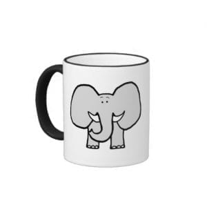 white mug with black handle and grey elephant cartoon